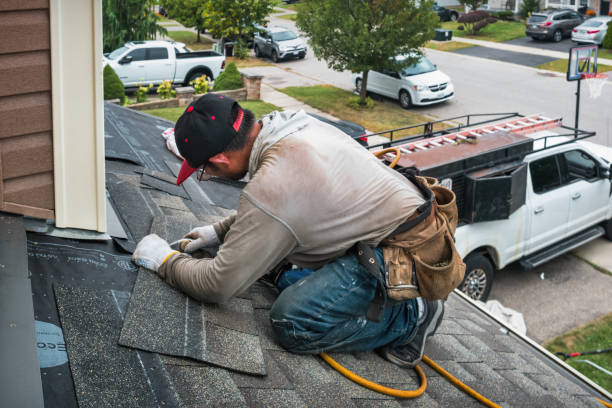 Professional Storm Damage Roof Repair technician working in Flowood, MS